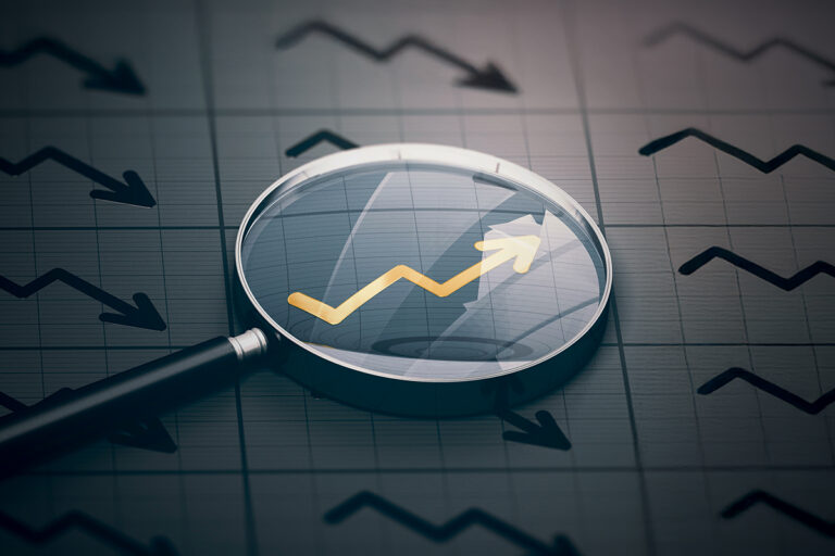 magnifying glass over an upwards arrow