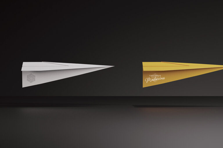 white paper plane behind a yellow paper plane